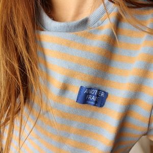 blue and yellow striped half sleeve loose top